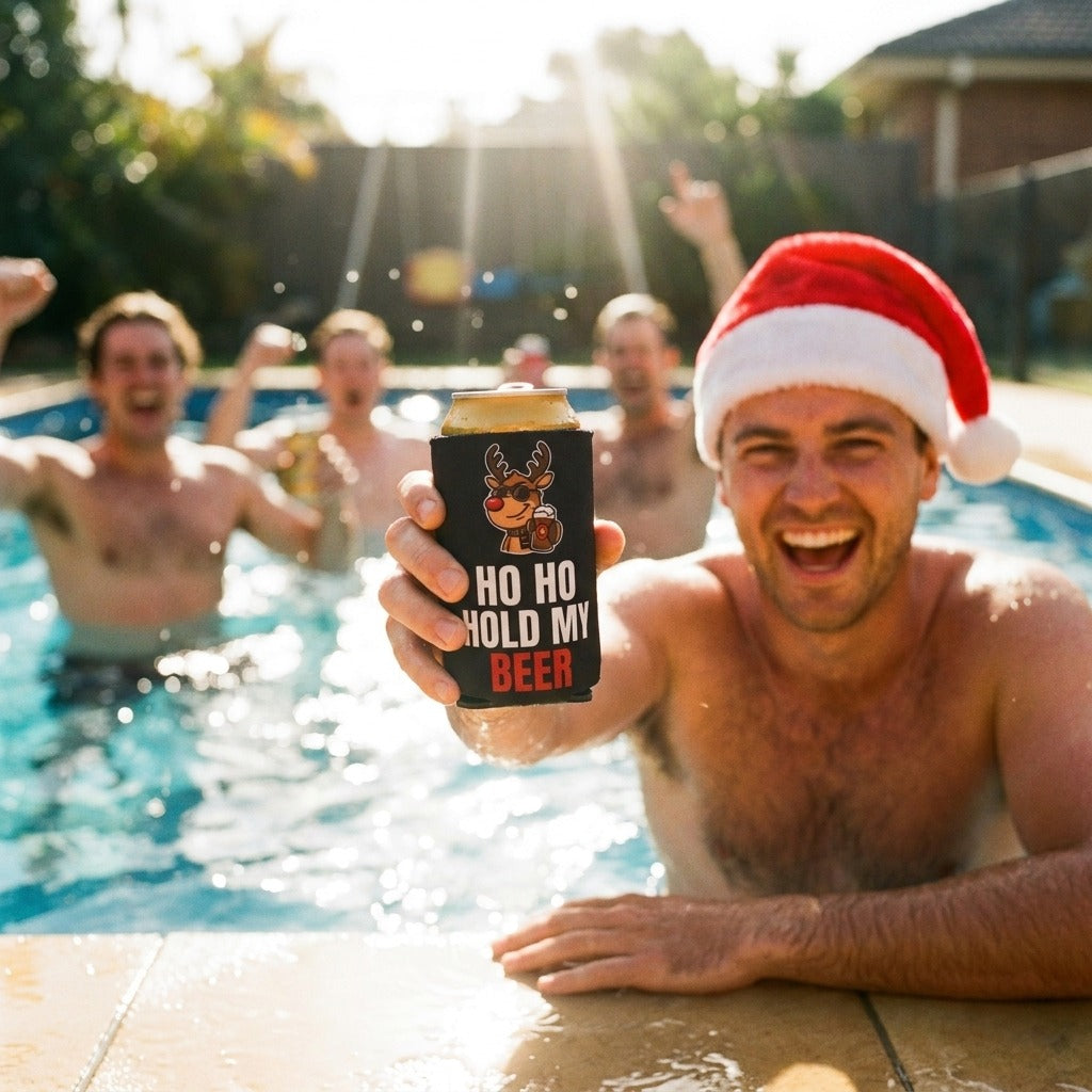 Ho Ho Hold My Beer stubby cooler by the pool